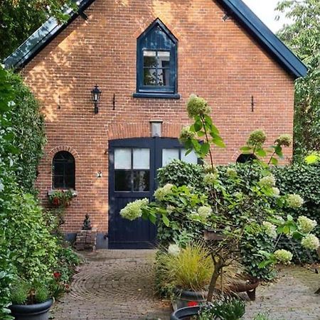 In Het Koetshuis Apeldoorn Bagian luar foto