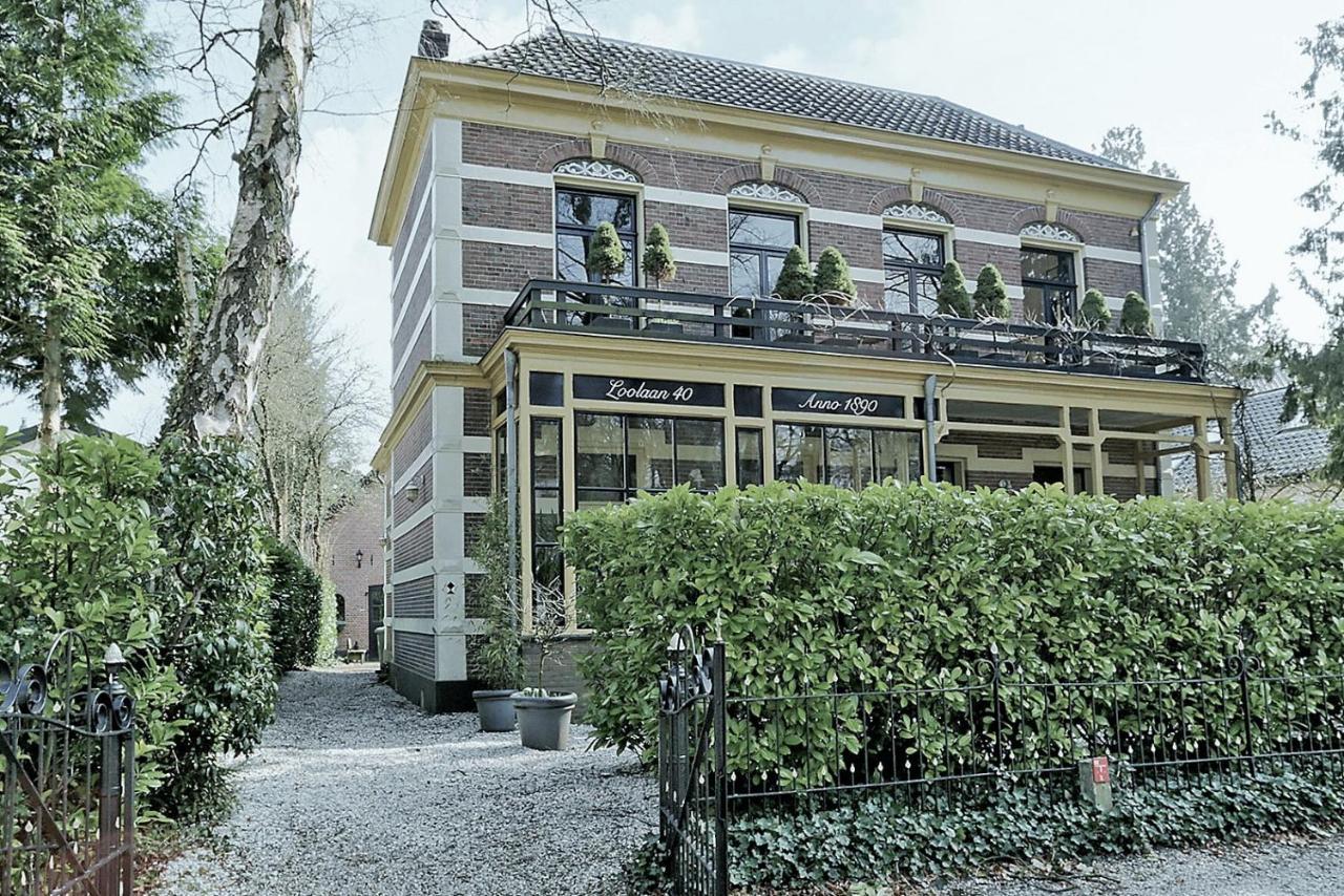 In Het Koetshuis Apeldoorn Bagian luar foto
