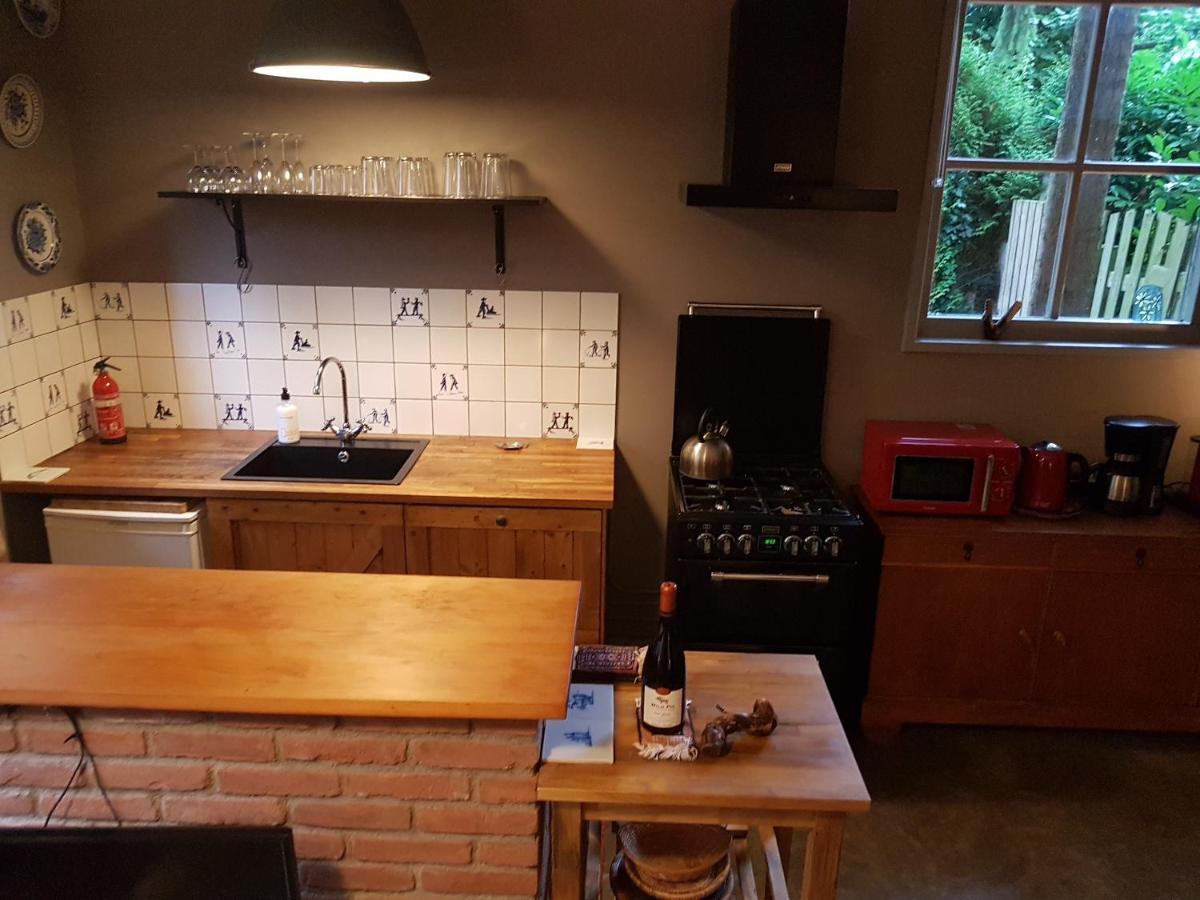 In Het Koetshuis Apeldoorn Bagian luar foto