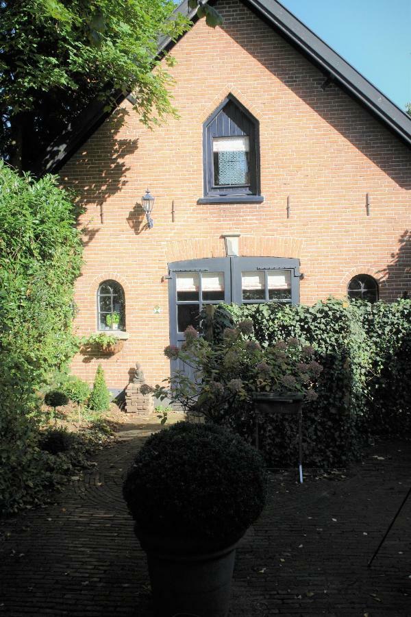 In Het Koetshuis Apeldoorn Bagian luar foto